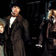 The fancy-dressed vampires of the big-screen Interview With the Vampire adaptation stand together.
